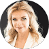 Professional portrait of Ina Sturlis, showcasing her friendly demeanor and stylish appearance.